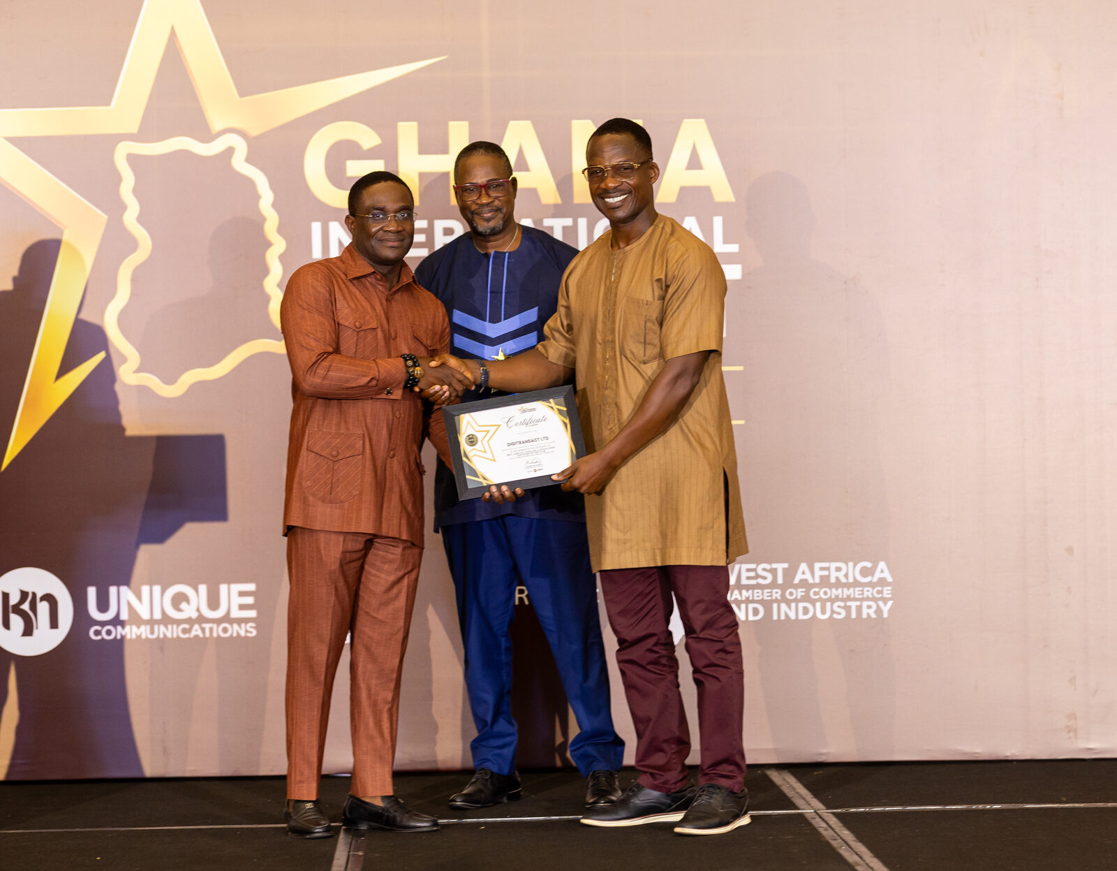DigiTransact receiving the Best African Language AI Innovation certificate on stage at the Ghana International Product Awards 2026